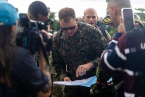 SOUTHCOM commander Gen. Francis Donovan studying a map during a site survey in Colombia