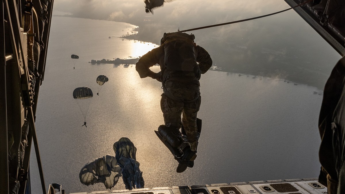 Special tactics Airman jumping from a KC-130J over Hurlburt Field, Florida
